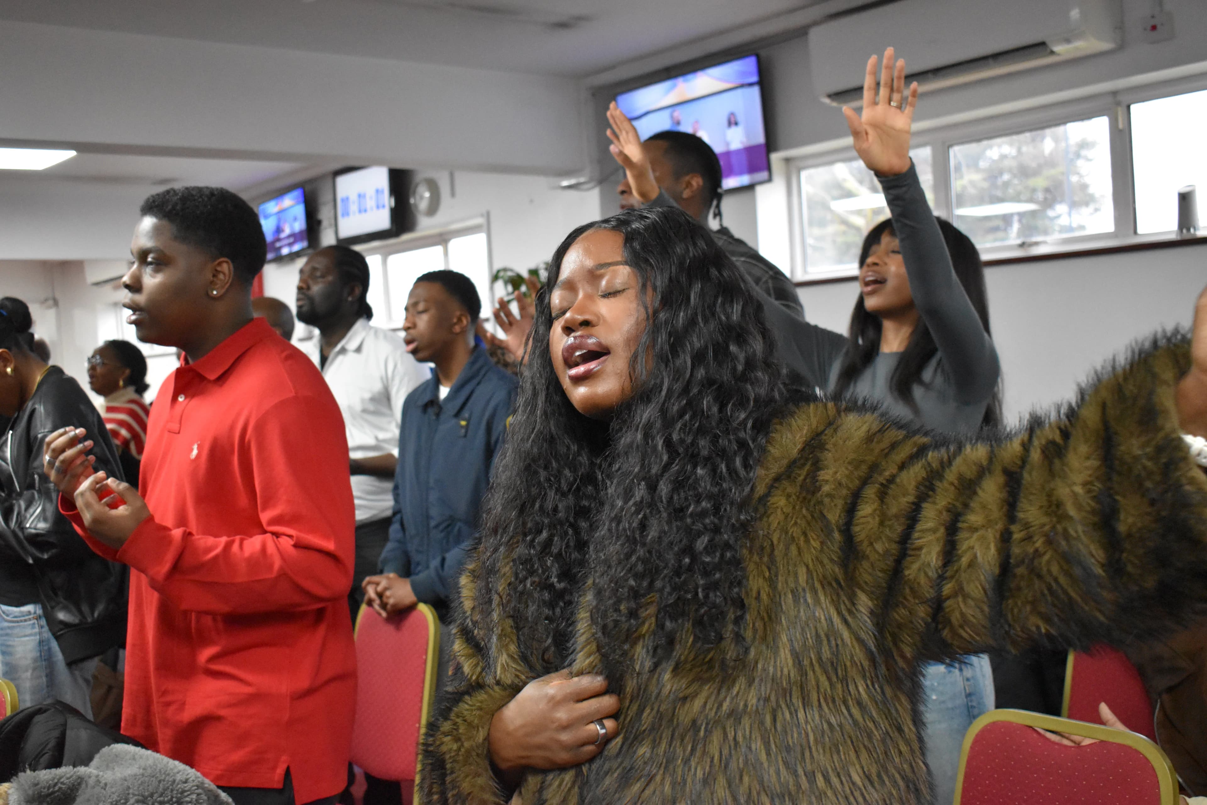 Worship during a Praise Tabernacle service.